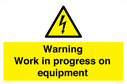 warning-work-in-progress-on-equipmentwith-electrical-hazard-symbol~
